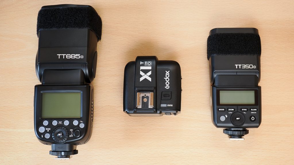 Godox Blitzkit, um entfesselt zu blitzen: Aufsteckblitz TT685, Aufsteckblitz TT350, Funkauslöser X1T – jeweils in der Produktversion O für MFT-Kamerasysteme