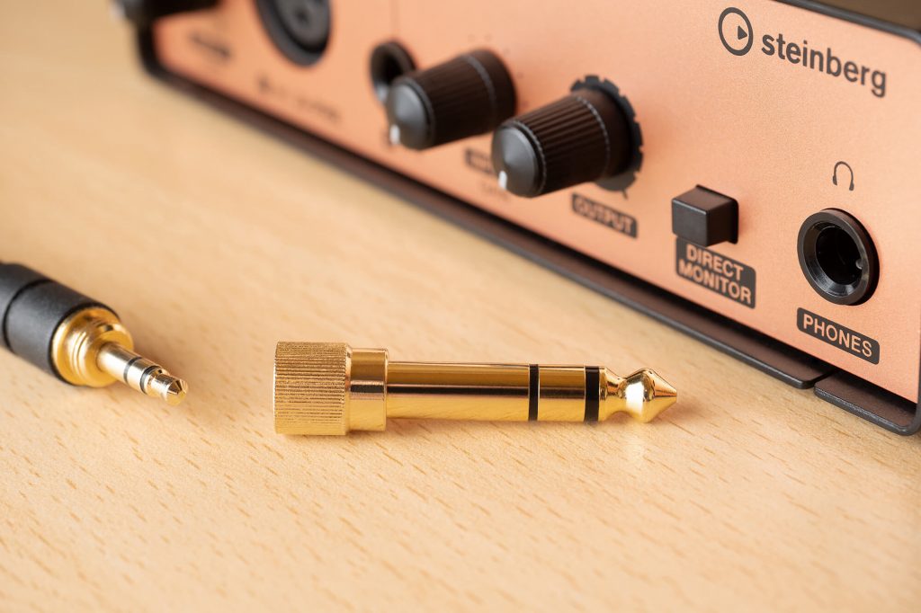 Schraubbarer Adapterstecker (Stereo): Miniklinke (3,5 Millimeter) auf große Klinke (6,35 Millimeter)